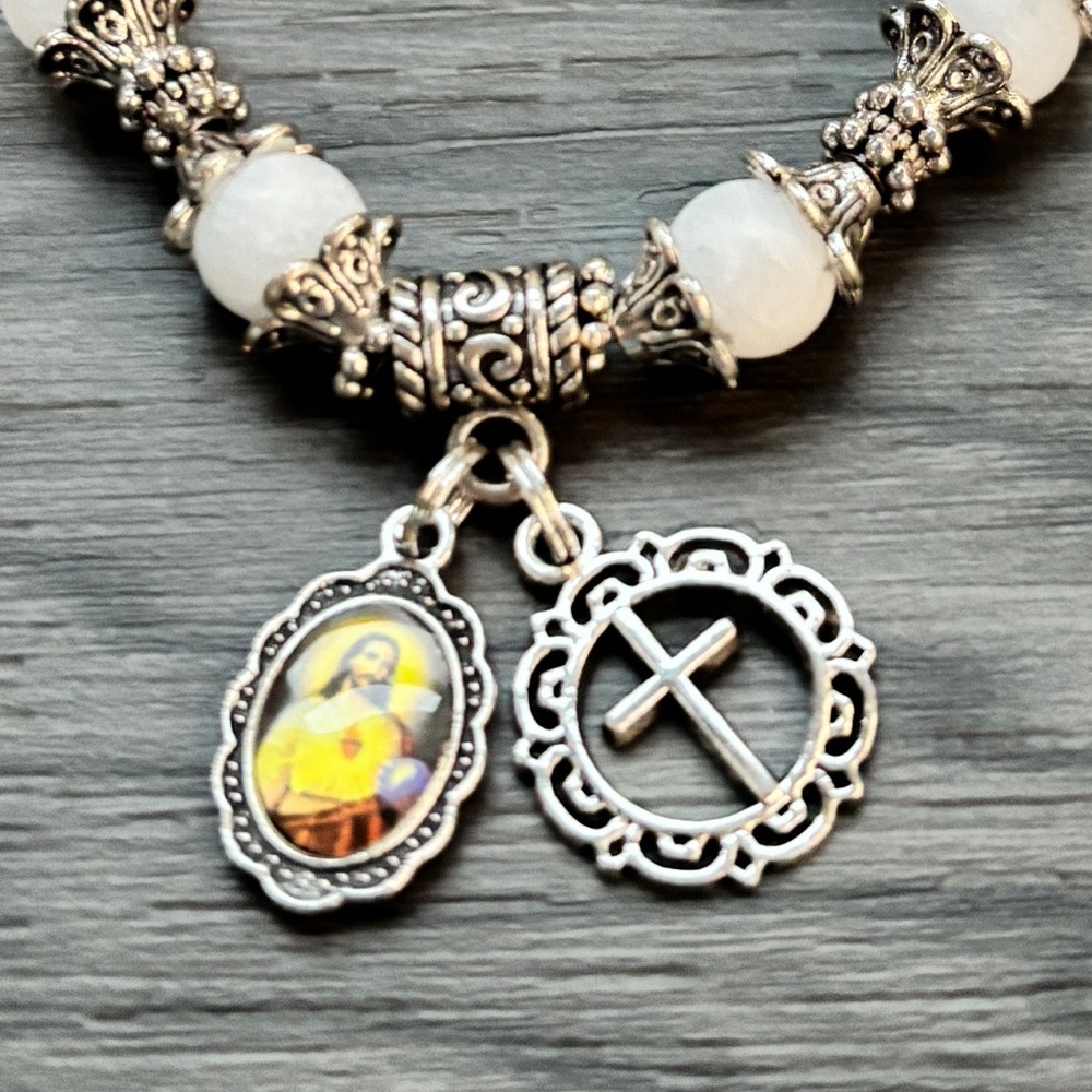 Silver and White Beaded stretch Bracelet with Religious Charms